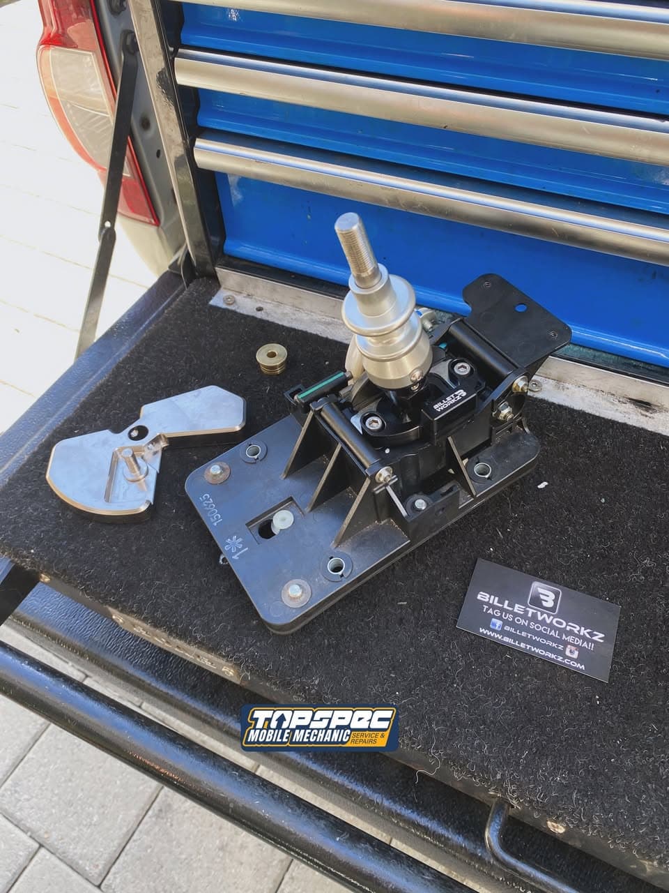 Short shifter upgrade being installed